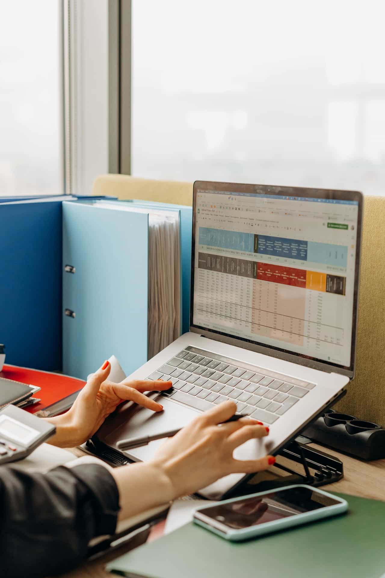 datylon-blog-Top-10-Excel-Essential-Automation-Tools-computer-with-spreadsheet
