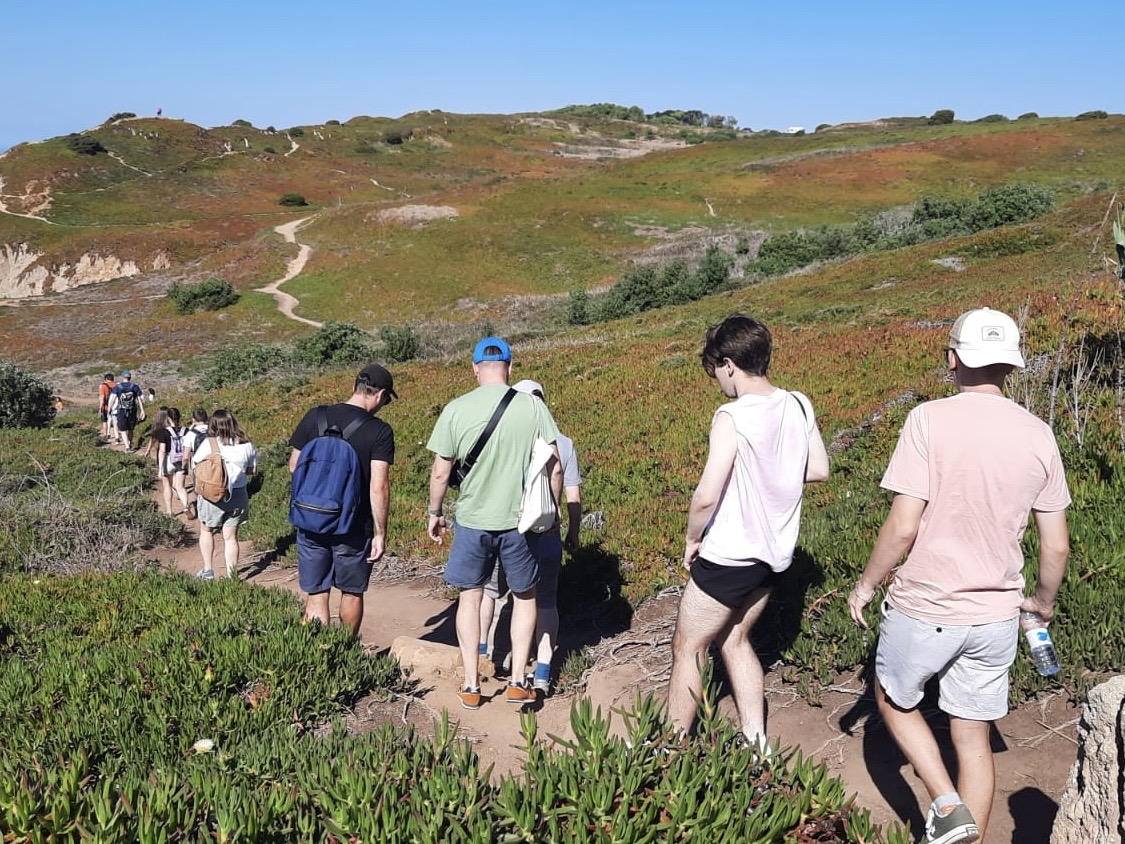 Team hiking in mountains Team hiking in mountains